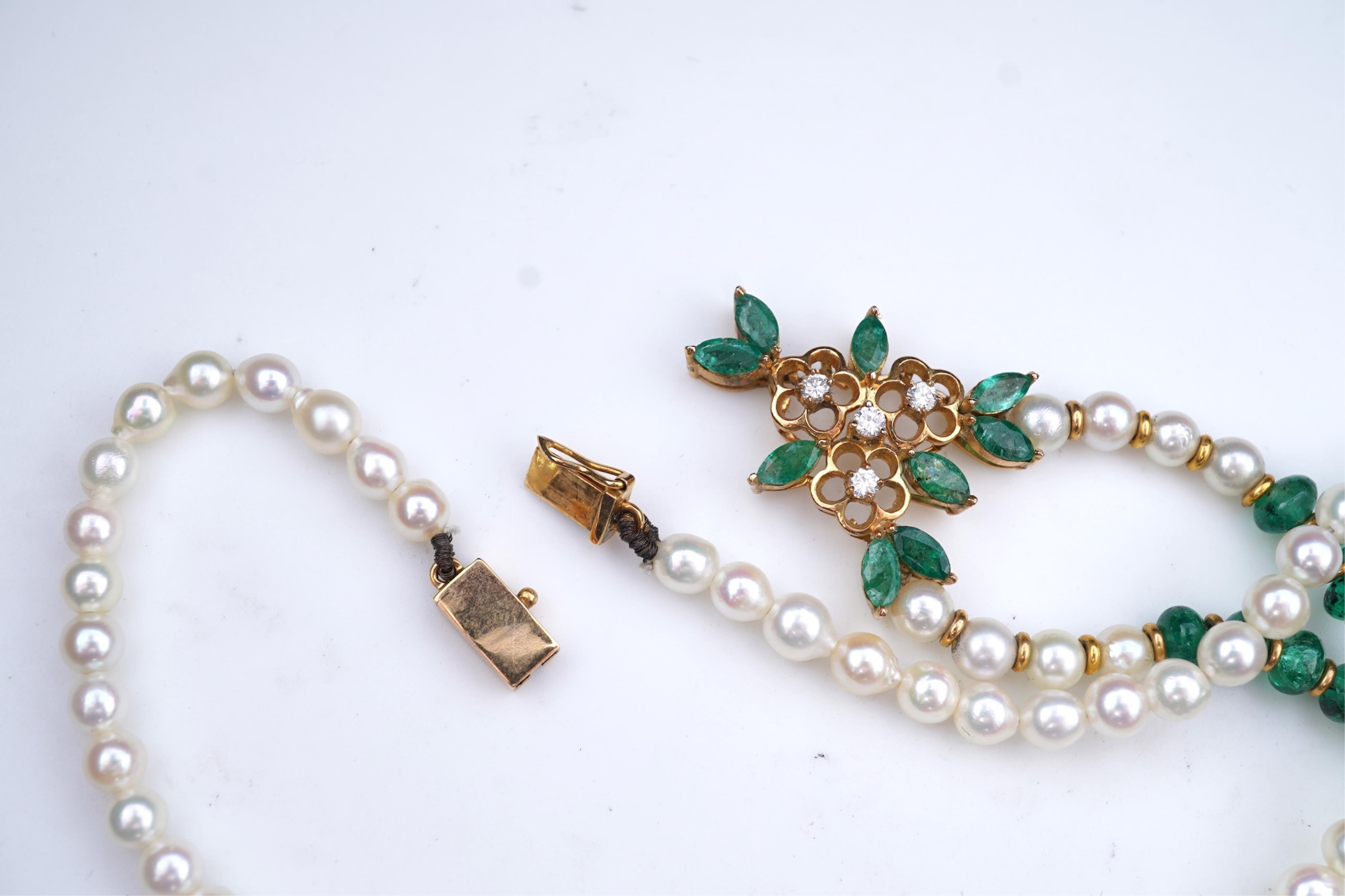 A cultured pearl, emerald and diamond parure